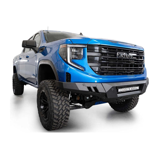 Close up of blue truck with big tire featured in add 2022+ gmc 1500 black label front bumper