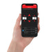 Hand holding phone with air lift wireless air control system v2 app for air spring management