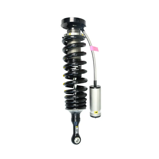 Close up of ome bp51 coilover shock absorb on white background