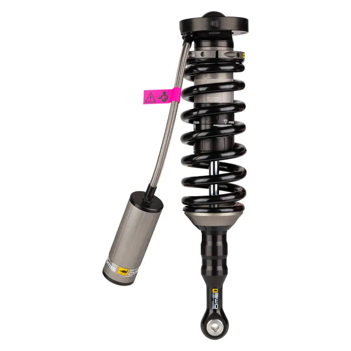 Close up of ARB / OME BP51 Coilover shock absorber with metal handle for Tacoma.