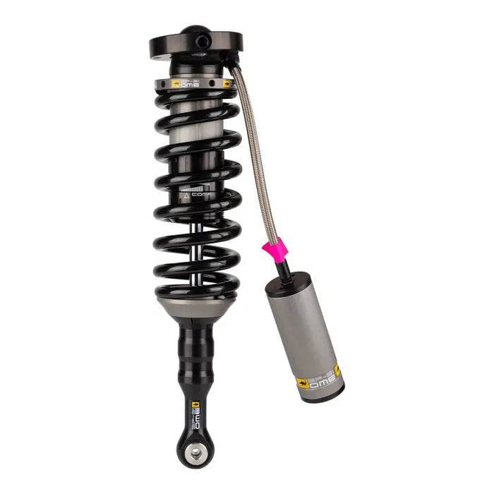 Close-up of pink-handled shock absorber from ARB / OME BP51 Coilover for Tacoma Front Right.