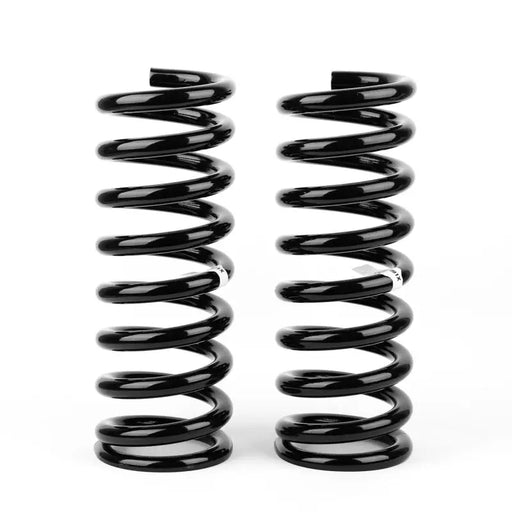 Black OME coil springs on white background for Jeep Wh Cherokee
