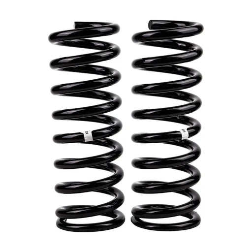 Black ARB / OME coil springs for Jeep Wh Cherokeef on white background