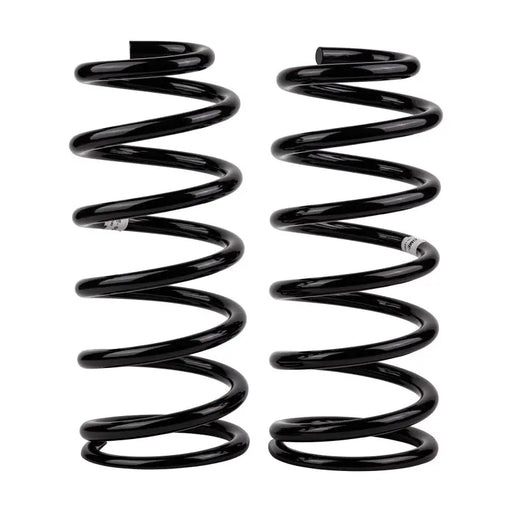 Black OME coil springs on white background - ARB / OME Coil Spring Rear Prado 150