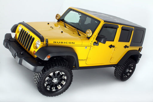 Yellow jeep with black bumper featuring avs original ventvisor window deflectors in smoke