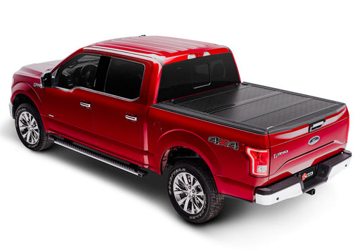 Red truck with bakflip g2 bed cover for ford f-150 5ft 6in bed