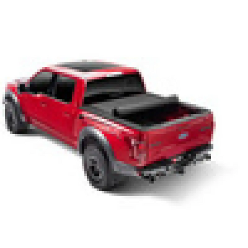 Red truck with black roof rack - BAK Revolver X4s 6.2ft Bed Cover for 16-20 Toyota Tacoma
