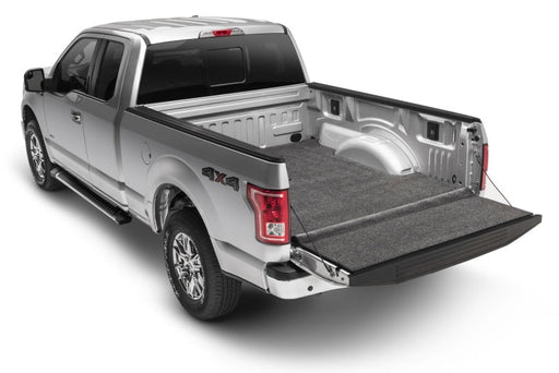 Bedrug xlt bed mat shown in truck bed with hook & loop design, suitable for toyota tacoma