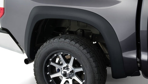 Gray truck with a black tire cover - bushwacker 95-00 toyota tacoma fleetside extend-a-fender style flares 4pc w/