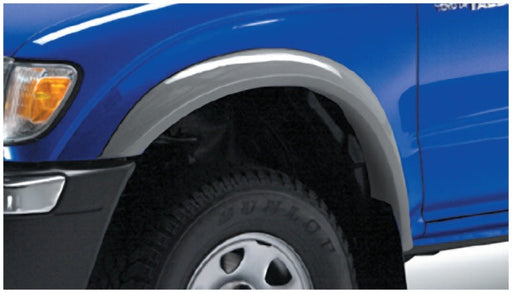Blue toyota tacoma extend-a-fender style flares with black wheels