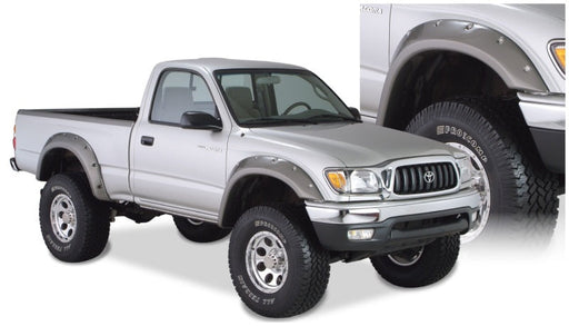 Toyota tacoma fleetside fender flares with big tire on truck