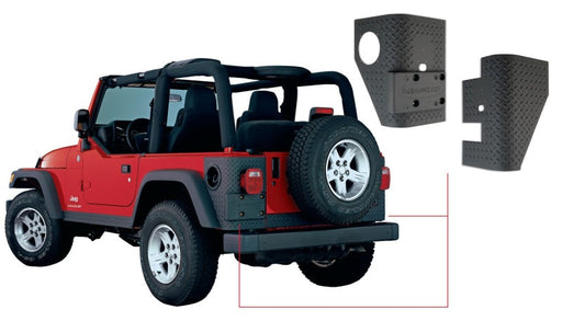 Red jeep wrangler with black tire cover trail armor