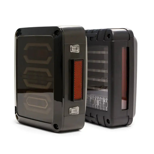 DV8 Offroad 07-18 Jeep Wrangler JK Octagon LED Tail Light featuring black and red alarm clock