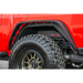 Red jeep with black tire and rim, DV8 Offroad Gladiator Rear Inner Fenders - Black.