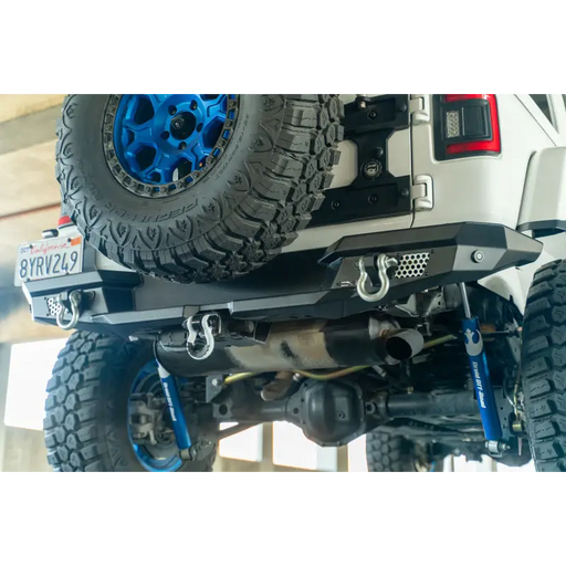 DV8 Offroad 2018 Jeep Wrangler JL MTO Series Rear Bumper with Blue Tire Carrier