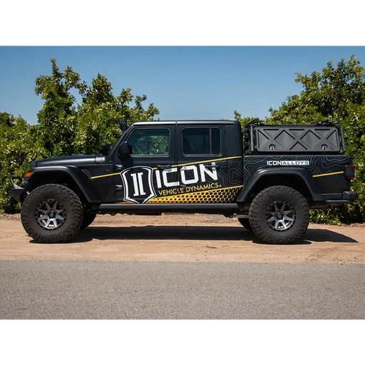 Black Jeep Gladiator with yellow and black decal - ICON 2020+ Jeep Gladiator 2.5in Stage 5 Suspension System (TUBULAR)