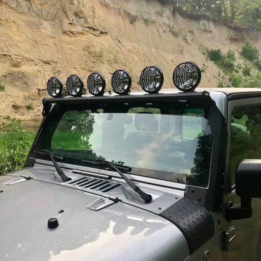 Jeep jk with xross bar overhead apollo pro halogen lights