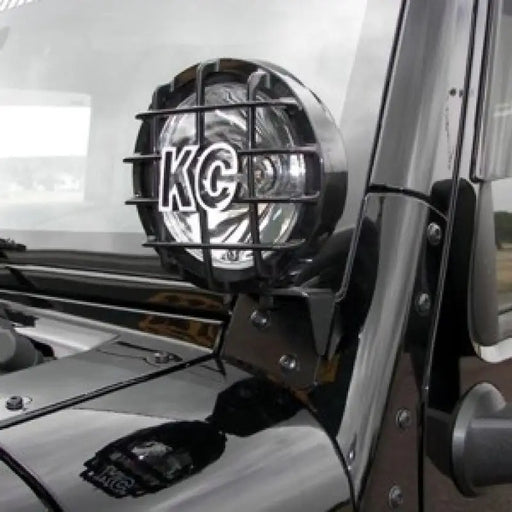 KC HiLiTES A-Pillar Windshield Light Mount Bracket Set on a Jeep with front light