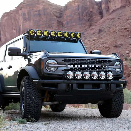 Black truck with yellow light - KC HiLiTES Ford Bronco Gravity LED Pro6 Light Bar Kit