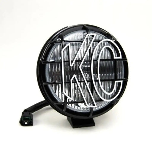 Black LED fog light with white beam for Jeep TJ replacement.