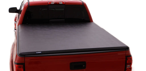 Lund 16-23 toyota tacoma hard fold tonneau cover - black, truck with bed on back