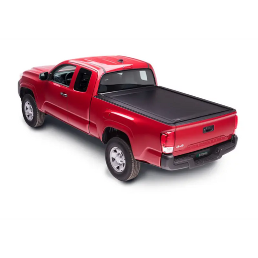 RetraxONE MX retractable truck bed cover for 16-18 Tacoma Double Cab with black bed.