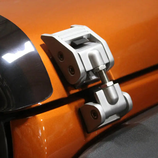 Silver hood catch kit car door handle close up view