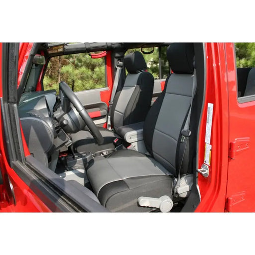 Front seats of red Jeep Wrangler JK with Rugged Ridge neoprene seat covers