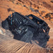 Black Jeep driving through desert showcasing Superwinch 10000 LBS 12V DC 3/8in x 85ft Wire Rope SX 10000
