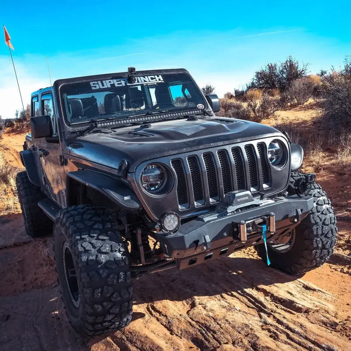 Jeep equipped with light bar driving off-road with Superwinch 10000 LBS 12V DC 3/8in x 85ft Wire Rope