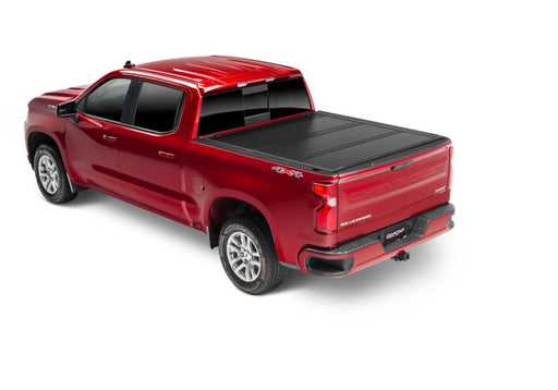Red truck with black undercover ultra flex bed cover - toyota tacoma 5ft, matte black finish