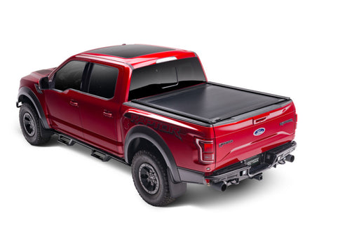 Red truck with black bed cover on retraxone xr for tacoma 5ft double cab, trax rail integration