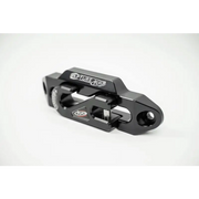 Black handlebar on front end of bike displayed in Addictive Desert Designs 1-5/16in Winch Fairlead Plate with Recessed Round End