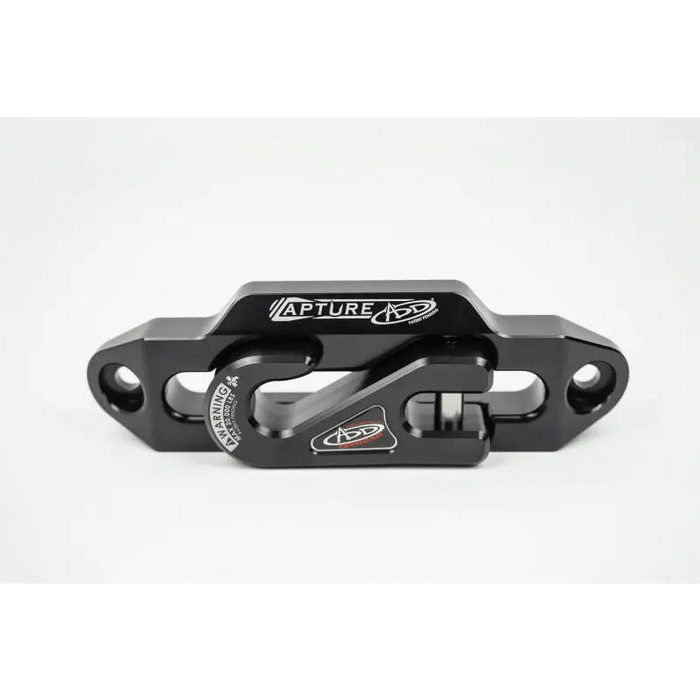 Black aluminum front brake cover with Addictive Desert Designs 1-5/16in Winch Fairlead Plate.