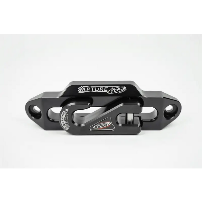 Black aluminum front brake mount with white logo - Addictive Desert Designs 1-5/16in Winch Fairlead Plate