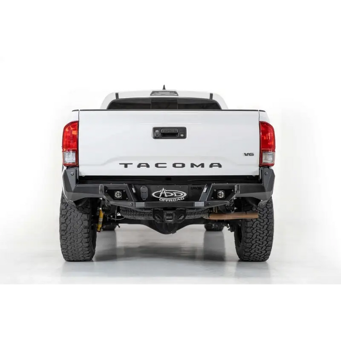 White truck with big bumper from Addictive Desert Designs for Toyota Tacoma Stealth Fighter.
