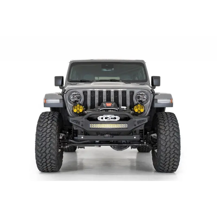 Close-up of Jeep with large front bumper in Addictive Desert Designs 18-20 Jeep JL/JT Sway Bar Skid Plate.