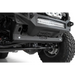 Close up of black ATV front bumper and bumpers on Addictive Desert Designs skid plate.