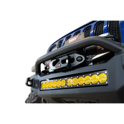 Blue jeep with yellow light - addictive desert designs rock fighter front bumper.