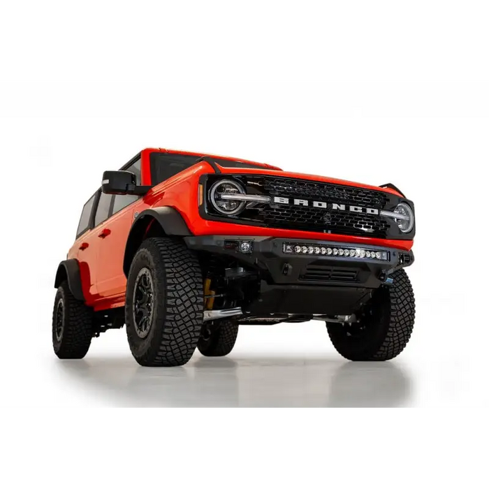 Red Jeep featured in Addictive Desert Designs 2021+ Ford Bronco Stealth Fighter Front Bumper Skid Plate Kit.