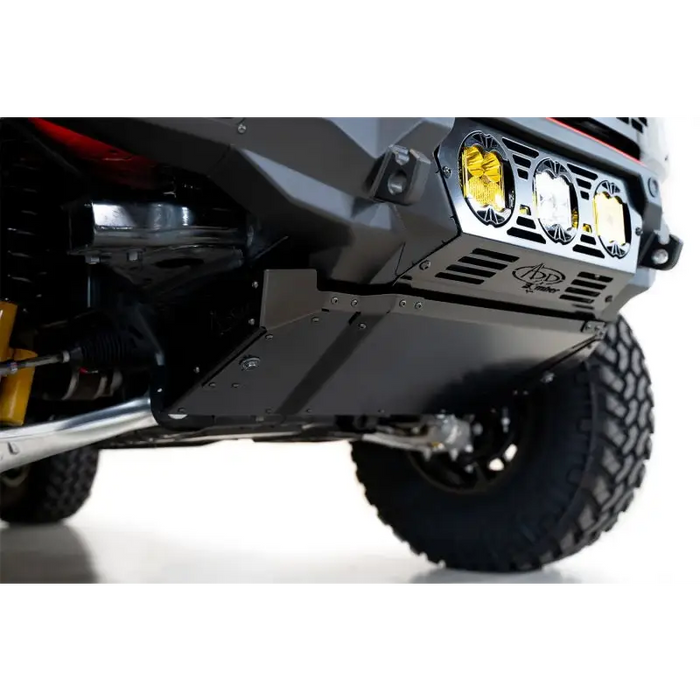 Close up of truck with bumper attached - Addictive Desert Designs skid plate for Ford Bronco Bomber.