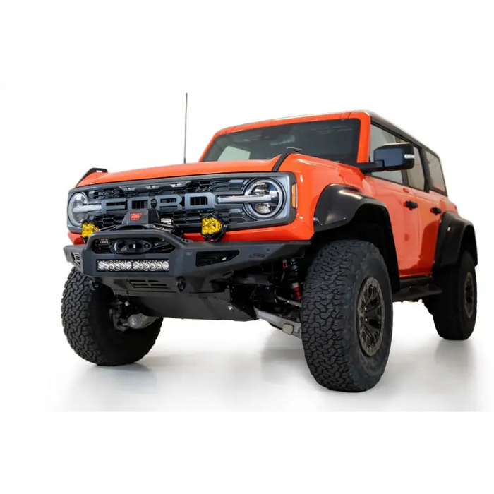 Red truck with a big bumper close up - Addictive Desert Designs Rock Fighter Skid Plate