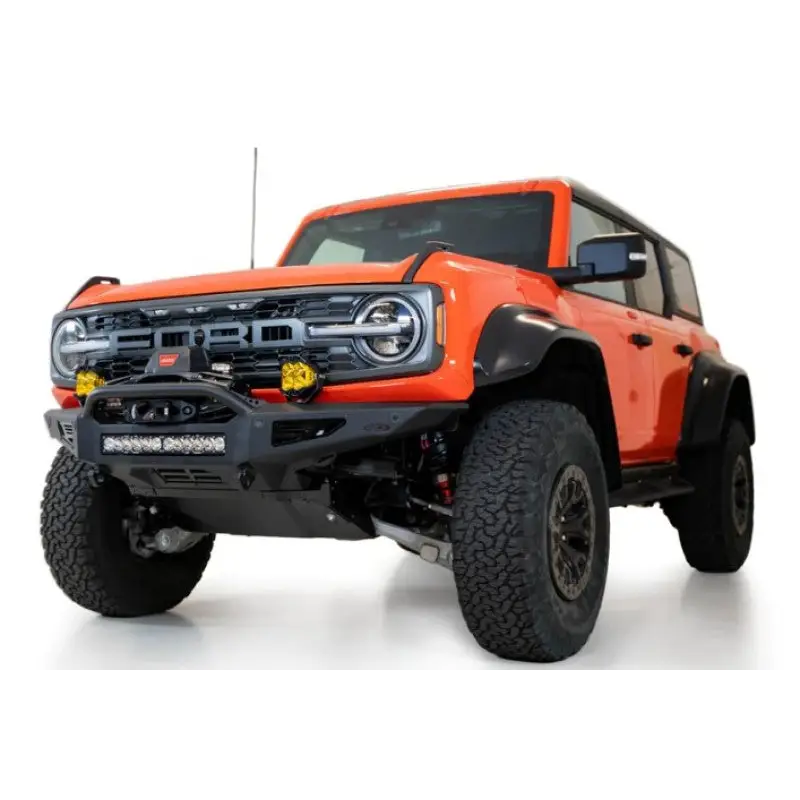 Close up of truck with large bumper and Rock Fighter Skid Plate by Addictive Desert Designs