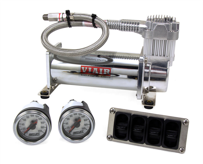 Close up of air lift 4-way manual control system compressor and gauges with hose