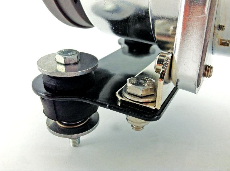 Close up of sewing machine button on air lift compressor isolator bracket kit
