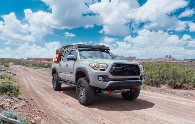 Air lift loadlifter 5000 air spring kit on toyota tacoma driving on dirt road