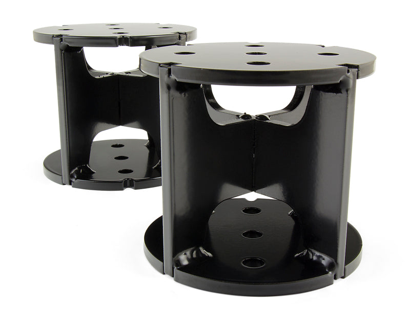 Black metal pedestals with holes for air lift universal level air spring spacer - 4in lift