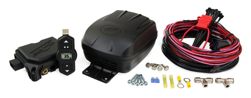 Close up of air lift wireless one (2nd gen) car wiring kit with wires and air pressure connections