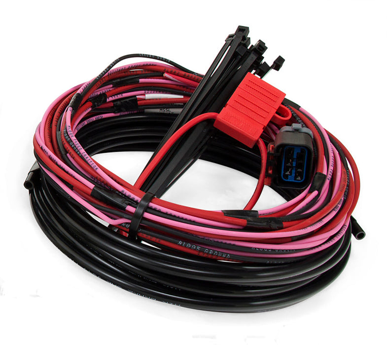 Close up of red and black wire harness with connector in air lift wirelessone harness for jeep wrangler