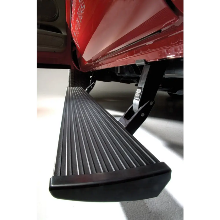 Red truck with black side step - amp research powerstep for toyota 4runner